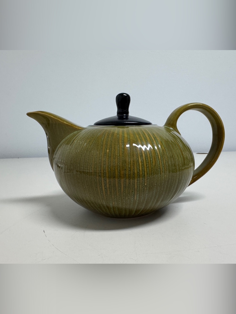 Gibson South Seas Collection Olive-Toned Ribbed Ceramic Teapot with Black Lid
